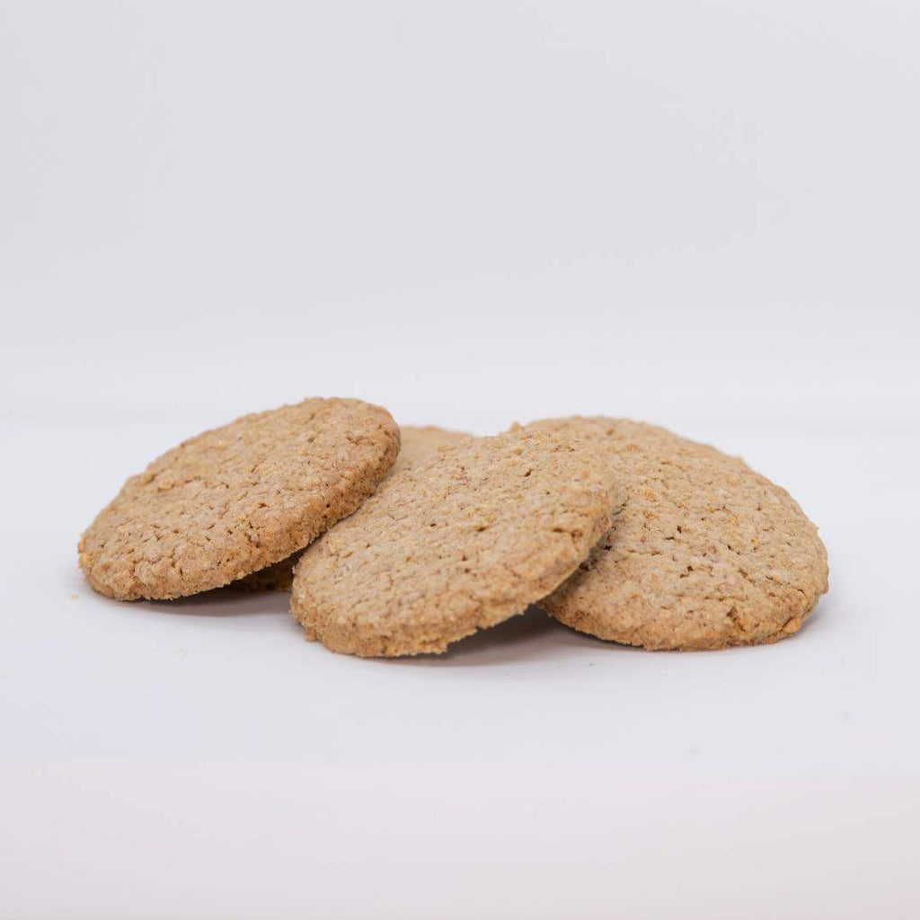 Three Proper Digestive Biscuits made with wholemeal wheat flour and Irish butter on a white background