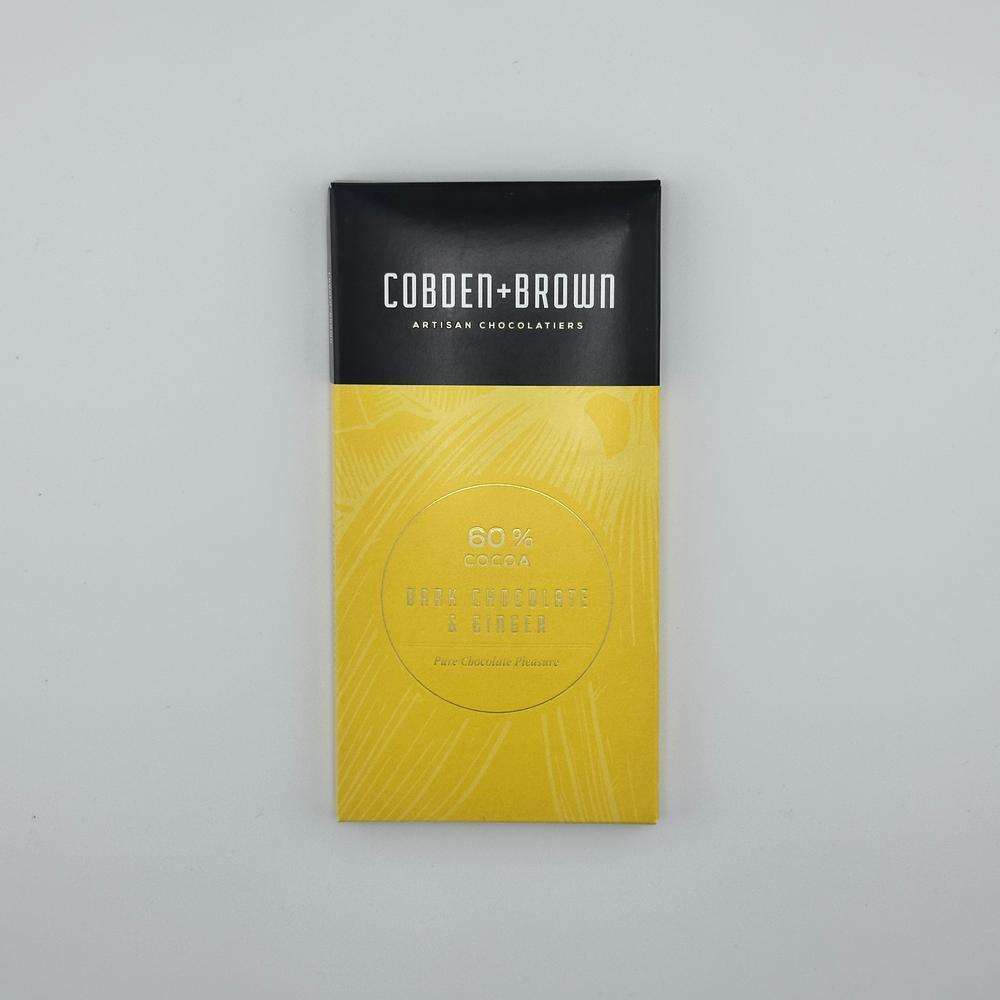 Cobden and Brown 60% dark chocolate bar with ginger in yellow and black packaging