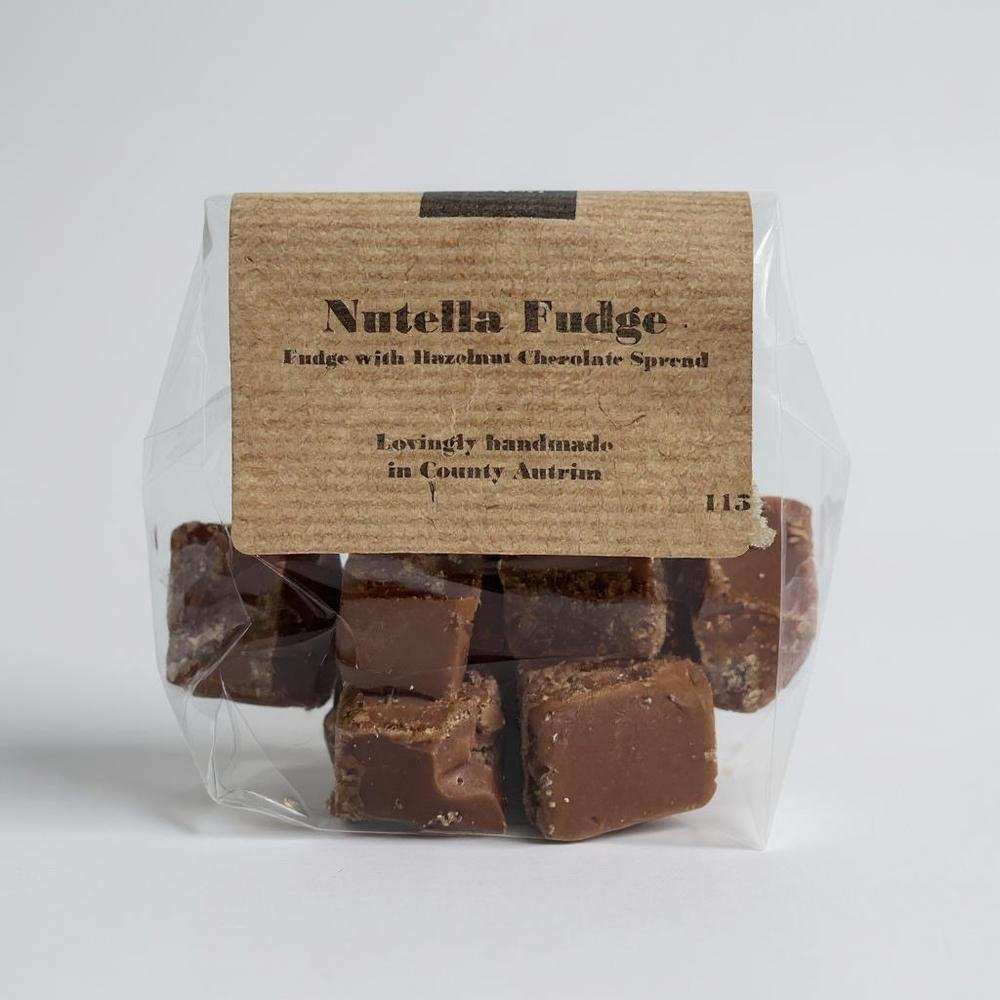 Packaged handcrafted Nutella fudge with hazelnut chocolate spread pieces