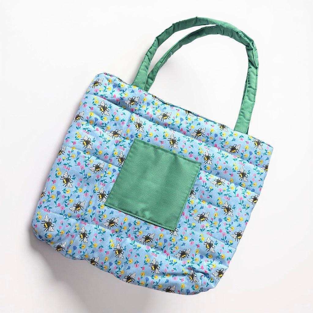 Handmade by Jessica quilted shopper bag with blue bee print and green pocket