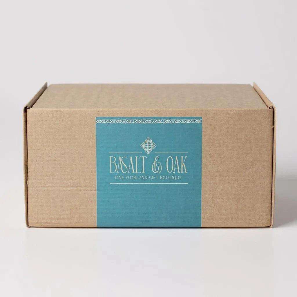 Single Kraft Hamper Box with Basalt & Oak label on plain background