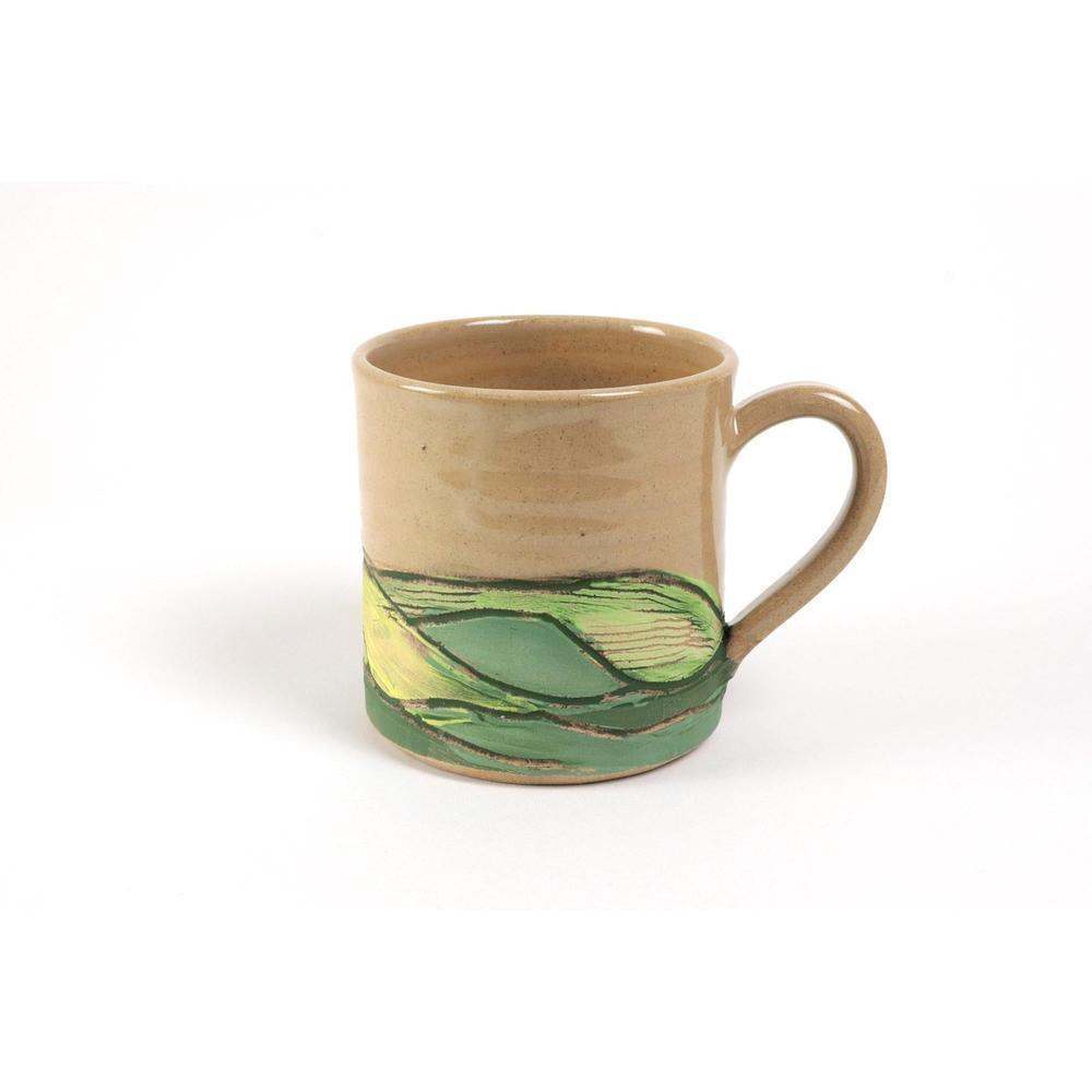 Handcrafted Mud Ireland Emerald Isle Mug with green patchwork design on beige porcelain clay