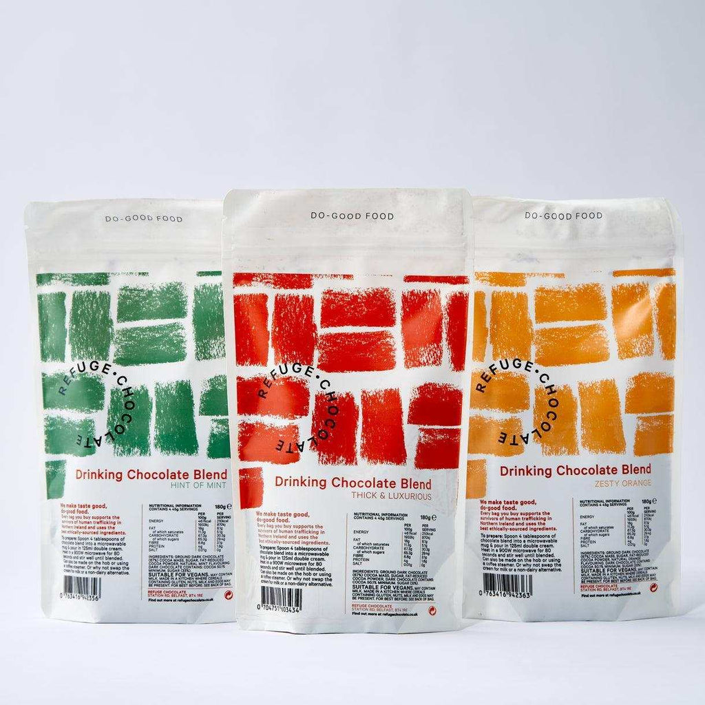 Refuge Hot Chocolate Mix three flavors original, mint, and orange drinking chocolate blends in white resealable bags