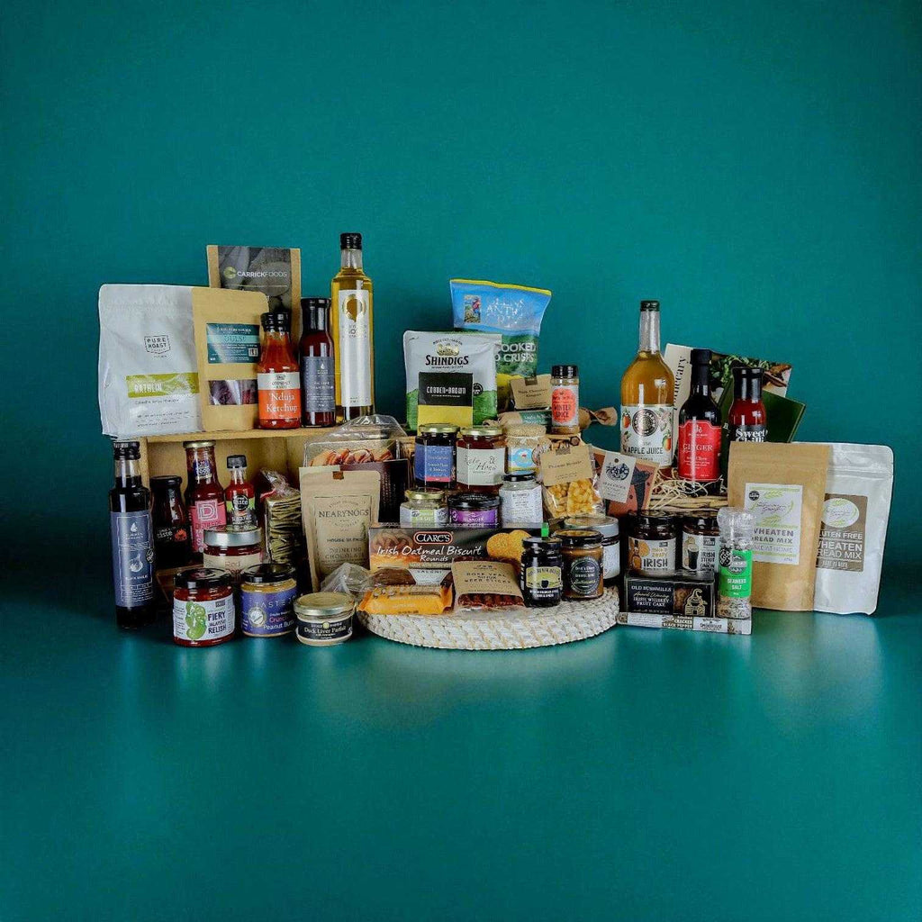 Seasons of the Glens Foodie Hamper with assorted gourmet food and drink products in a branded box